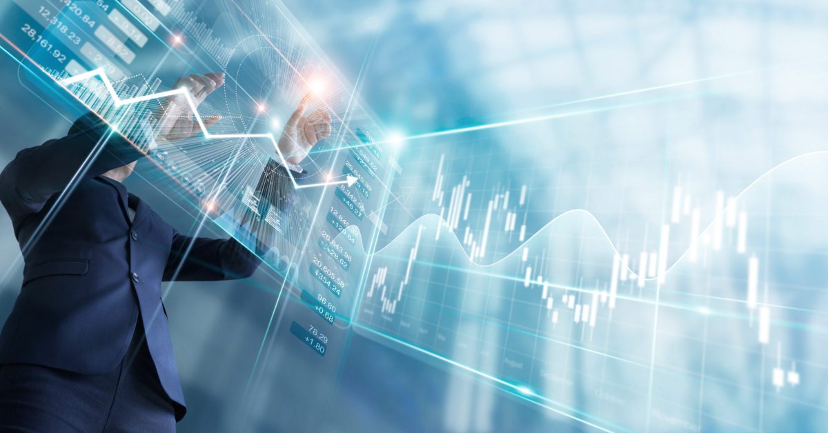Uprisen angle, Businessman touching finance growth and graph chart analysing diagram sale data, stock market and currency exchange on virtual interface.
